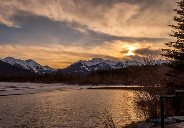 istock Sun setting over the mountains. Vermillion Lakes, Banff National Park, Alberta, Canada 1799038529