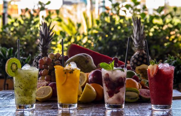 istock Close-up of fresh fruit and vegetable juices on the table 1799171710