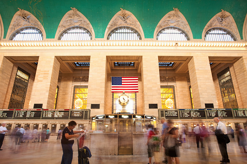 Manhattan, New York City, USA - December 25, 2019: Grand Central Terminal main hall full of tourists and commuters ready to catch a train on Christmas day