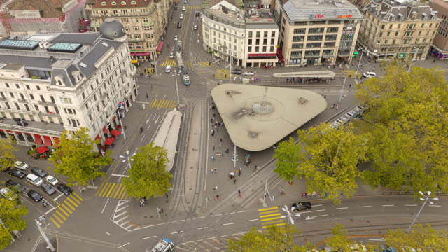 day time zurich city center famous opera traffic square lakeside aerial panorama timelapse 4k switzerland
