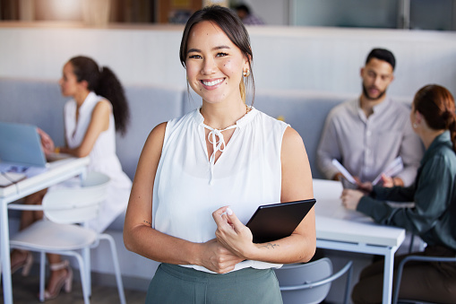 Businesswoman, office and portrait with tablet, employees and company staff. Corporate, finance manager and happy with feedback, professional and worker for management, career and smile with pride