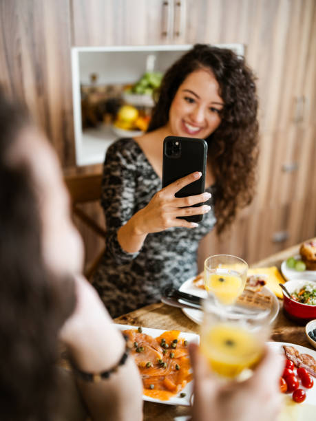 istock Young mixed race couple enjoying brunch at home 1799320596