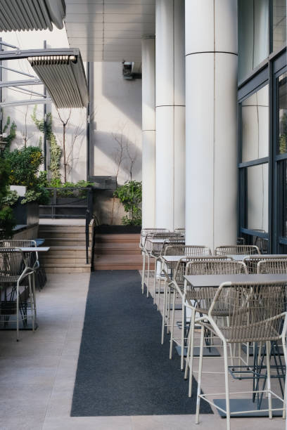 istock tables and chairs in outdoor exterior 1799408707