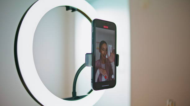 istock Closeup media person recording tutorial smartphone display view. Woman talking 1799456349