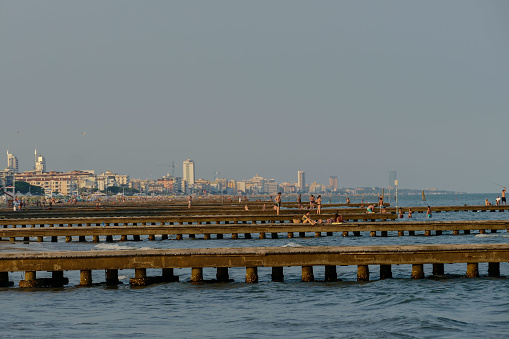 Pier Beach of Lido di Jesolo at adriatic Sea in a beautiful summer day Italy