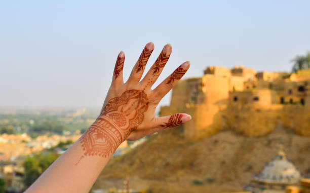 istock Henna tattoo on woman hands 1799533324