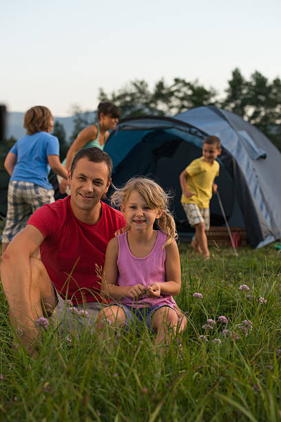 istock Family camping, having fun in the nature. 179955395