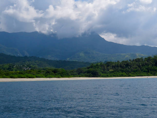 istock View of a tropical island on a cloudy day. 1799613892
