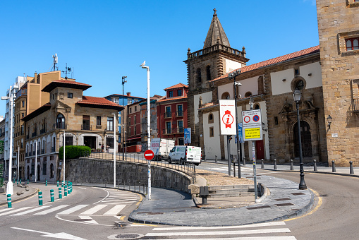 Curved street in front of the Gijón marina with classic buildings from the city center. Principality of Asturias. August 1, 2023