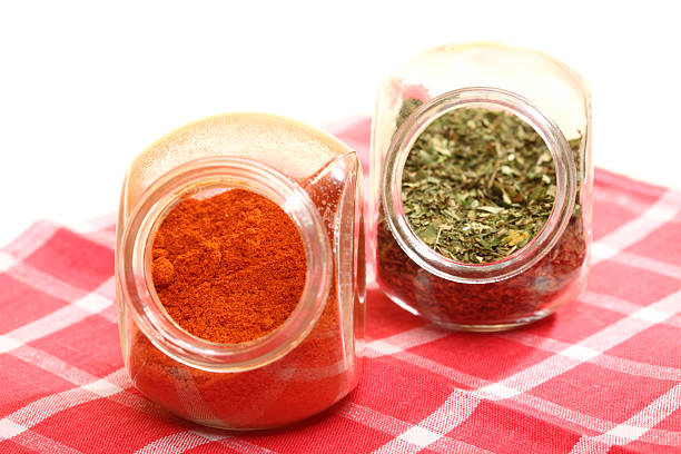 istock jars with spices paprika and lovage isolated 179963756