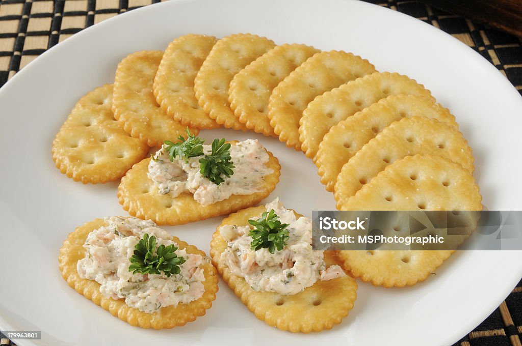 Smoked salmon spread on crackers Gourmet smoked salmon spread on crackers Dipping Sauce Stock Photo