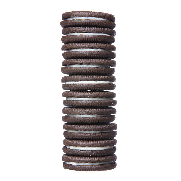 istock Chocolate cookies with cream filling tower isolated 179966239