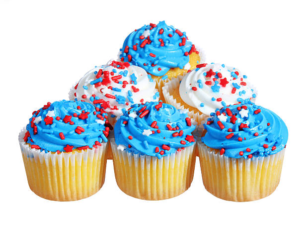 istock Cupcakes with blue and white cream on the top, isolated 179966260
