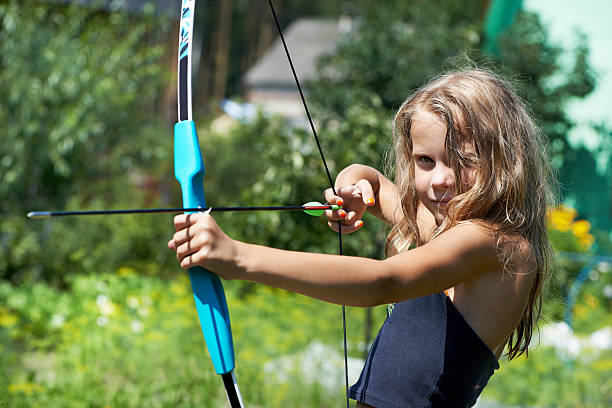 istock Girl shoots a bow 179976523
