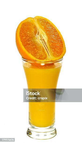 Jugo De Naranja Y Corte Foto de stock y más banco de imágenes de Alimento - Alimento, Blanco - Color, Comida sana