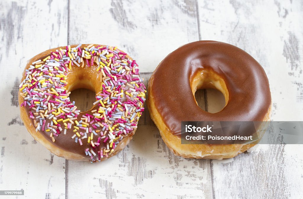 Due donuts - Foto stock royalty-free di Alimentazione non salutare