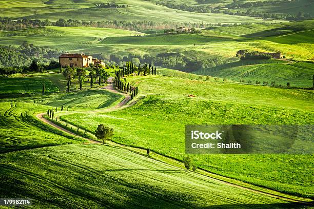 A Beautiful Sunset Over A Farmhouse In Tuscany Stock Photo - Download Image Now - Agricultural Field, Agriculture, Beauty In Nature