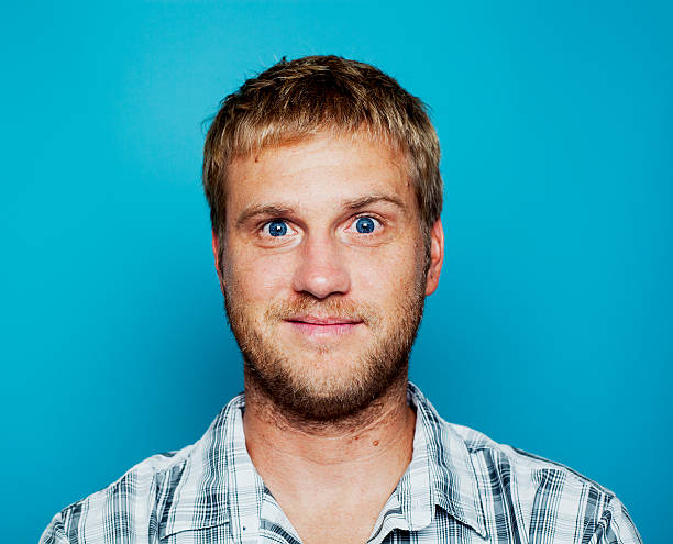 Happy blonde blue-eyed man stock photo