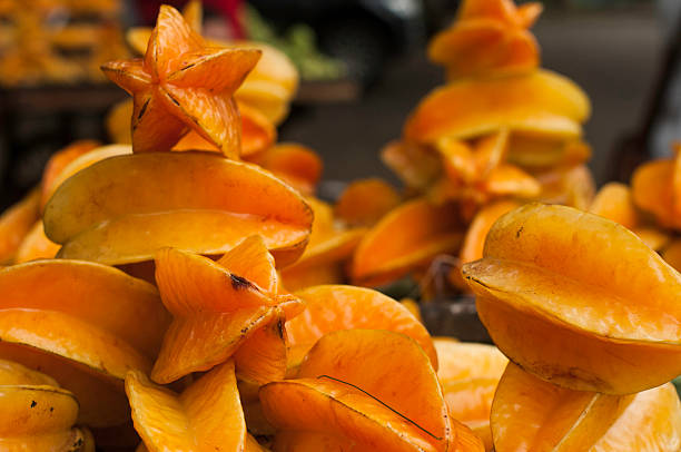 Star fruit on decorative pile stock photo