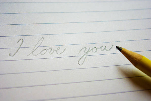 istock Blank paper with pencil on wood table 179989447