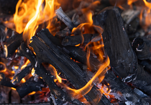Close-Up Of Intricately Burning Campfire With Beautiful Flames And Charcoal