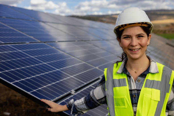 istock Woman engineer working in solar panel power plant 1799912548