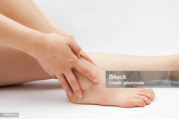 Ankle Pain Stock Photo - Download Image Now - Adult, Adults Only, Alternative Therapy