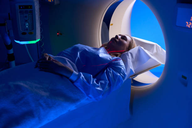 istock Female patient undergoing contrast-enhanced chest computed tomography 1799926788