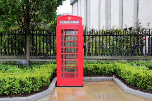 London, United Kingdom - red telephone box in the rain