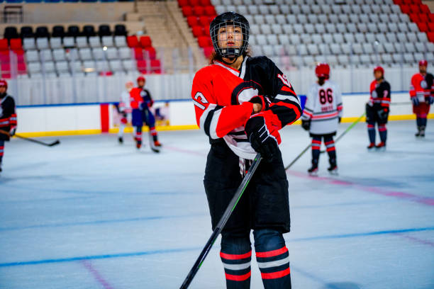 istock Women's Ice Hockey Offense Player Portrait 1799962996