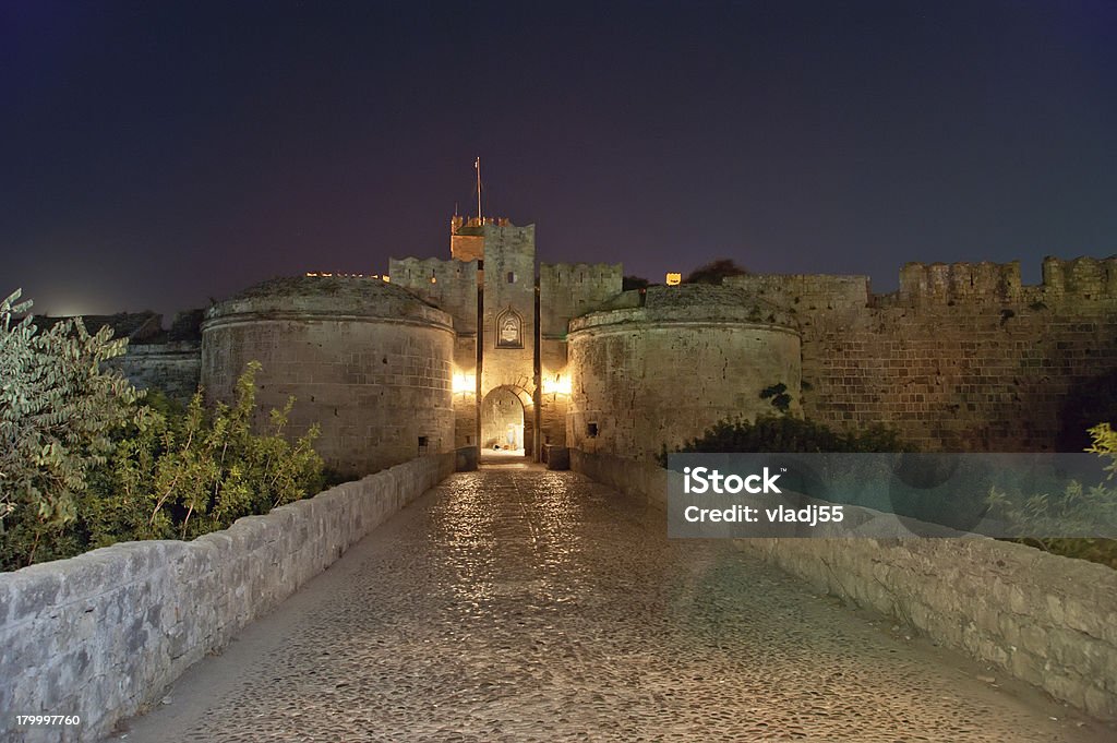 Medieval city walls in Rhodes town (night), Greece Ancient Stock Photo