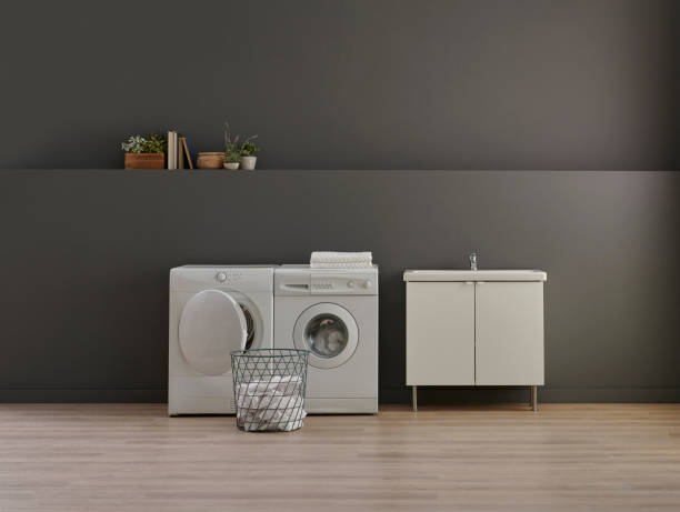 istock Bathroom, laundry, washing and dry machine, sink cabinet, mirror and object, grey wall background. 1800010310
