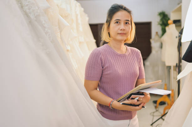 istock SME business owner second hand wedding studio online store using digital tablet for online platform 1800018726