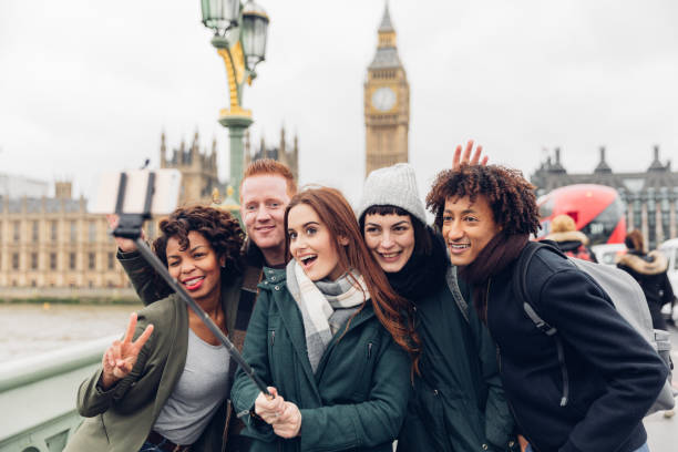 istock Group of multi ethnic friends enjoying London 1800032177
