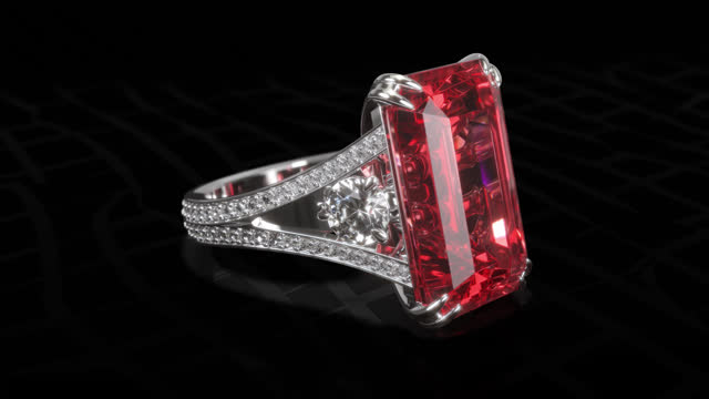 White gold ring with red stone and diamonds