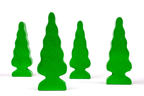 istock Wooden green toy trees isolated on white 180010193