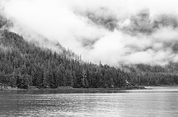 istock Fog & Clouds On Mountains Near Tracy Arm Alaska 180010465
