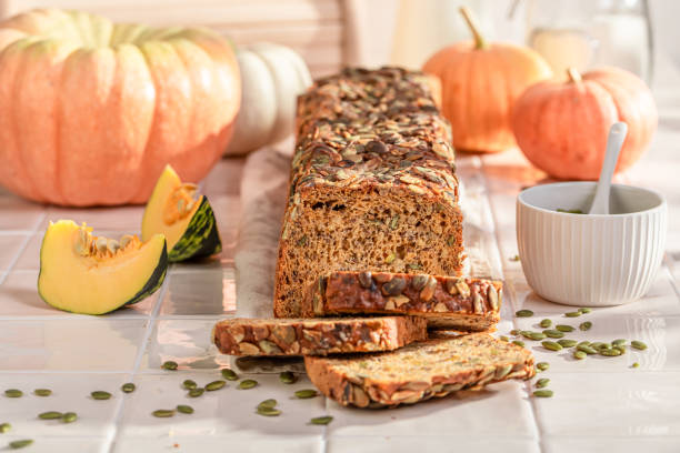 istock Fresh pumpkin bread with sesame seeds and grains. 1800140128