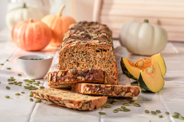 istock Homemade pumpkin bread as holiday bread for Halloween. 1800144968