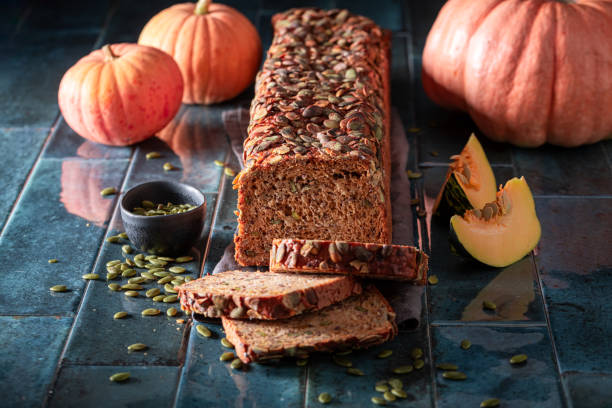 istock Golden pumpkin bread as holiday bread for Halloween. 1800147133