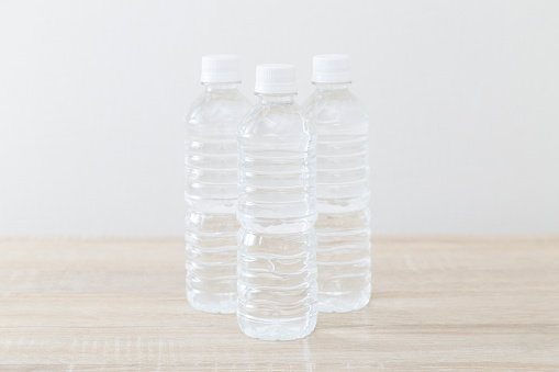 Plastic bottle of drinking water on the desk