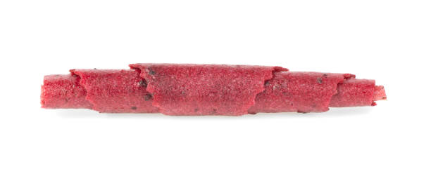 istock Natural and healthy snack food - fruit pastille from apples, raspberry and currant on a white background. Fruit Marshmallow. 1800174015