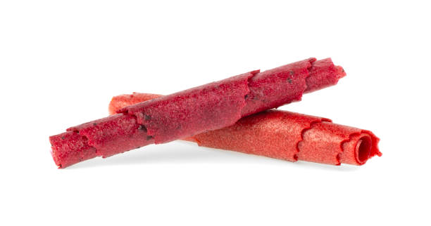 istock Natural and healthy snack food - fruit pastille from apples, raspberry and currant on a white background. Fruit Marshmallow. 1800174021