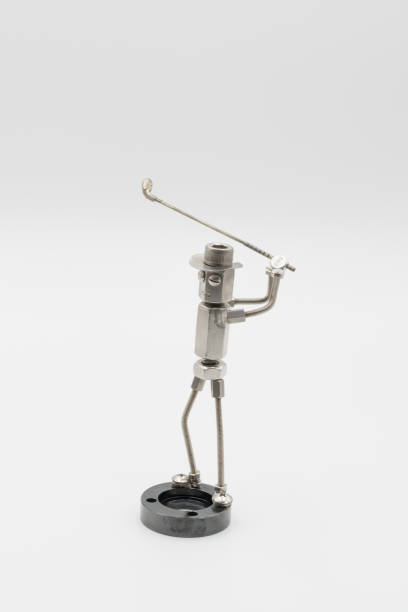 istock Golfer doll/metal figure swinging a driver 1800190057