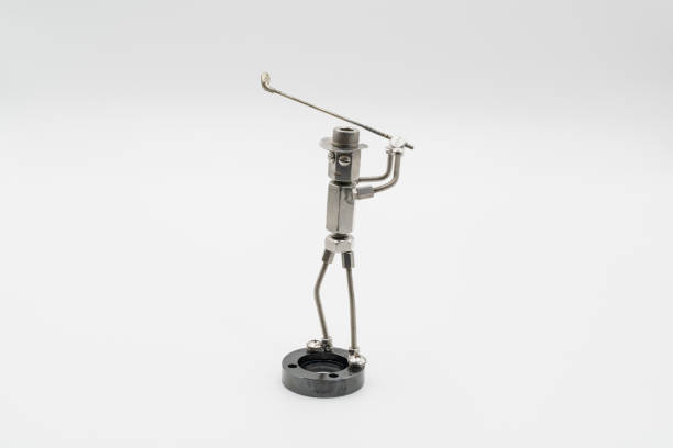 istock Golfer doll/metal figure swinging a driver 1800192325