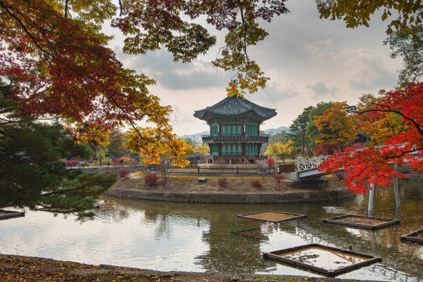 istock Old town, trees, leaves changing color, river 1800209617