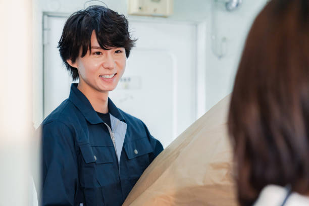 istock A male staff member making a home delivery 1800242173
