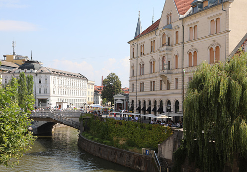 Ljubljana, L, Slovenia - August 16, 2023: famous bridge called Tromostovje that means Triple Bridge