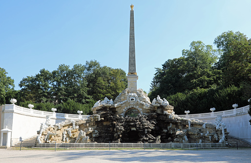 Vienna, WIEN, Austria - August 22, 2023: High Obelisk in the park of Schonbrunn Palace residence of Habsburg dynasty