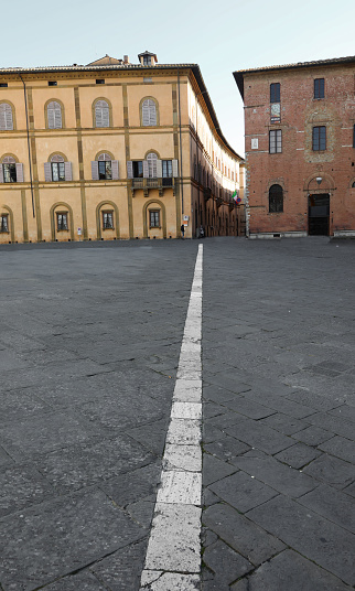 Siena Cathedral Square and the white line that once demarcated the power of the church from the power of the adjacent hospital building
